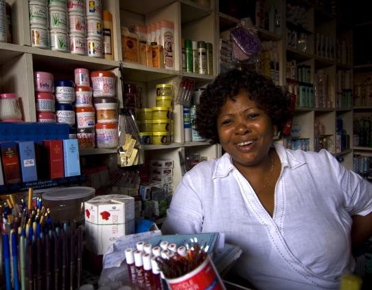 Woman at her store Woman at her store