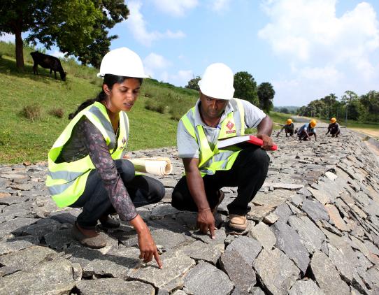 Male and female construction workers