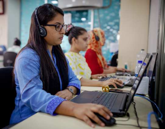 Women working in a computer Women working in a computer