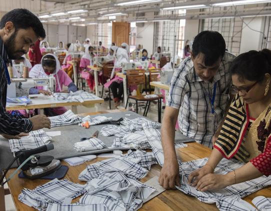 Workers at a garmet factory Workers at a garmet factory