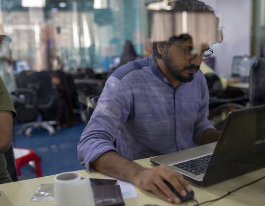 Person using a computer Person using a computer