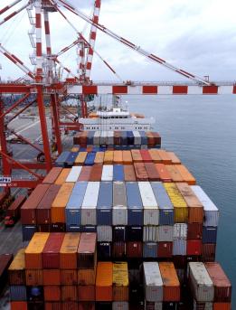 Trade boat loaded with containers Trade boat loaded with containers